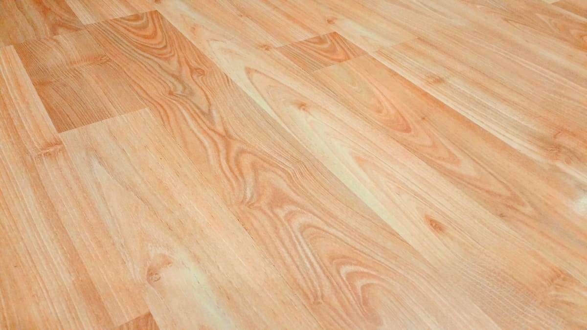 Close view of laminate floor boards locked together