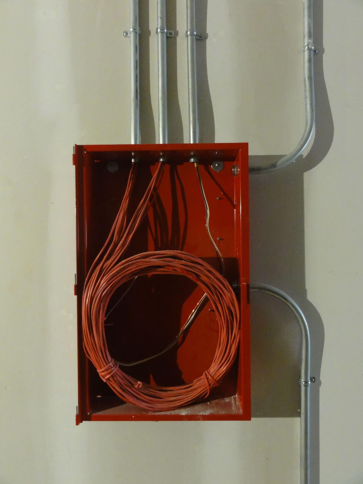 Wiring run into an electrical box mounted on a wall